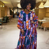 Flowy Àbíkẹ́ Kaftan in vibrant purple, orange, green, and red, designed for effortless elegance.